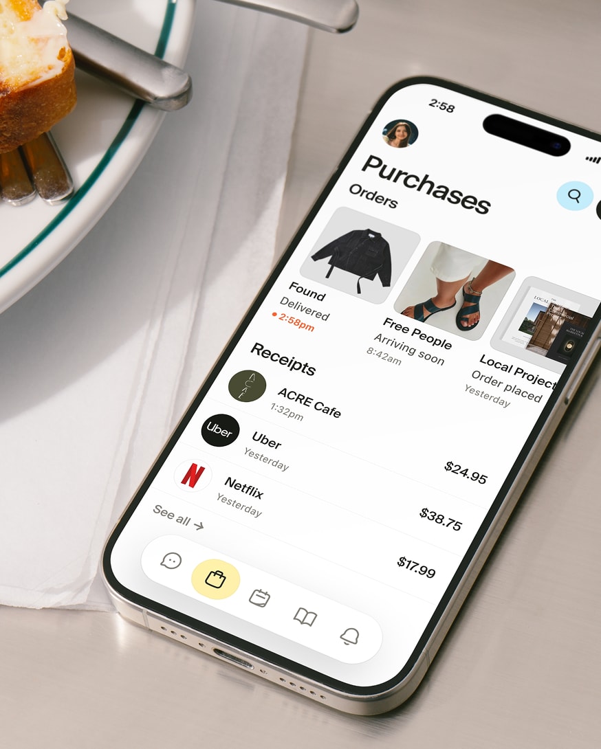 A phone placed on a cafe table, showing the orders screen